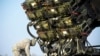 Poland -- A US soldier inspects a Patriot missile defence battery during join exercises at the military grouds in Sochaczew, near Warsaw, March 21, 2015